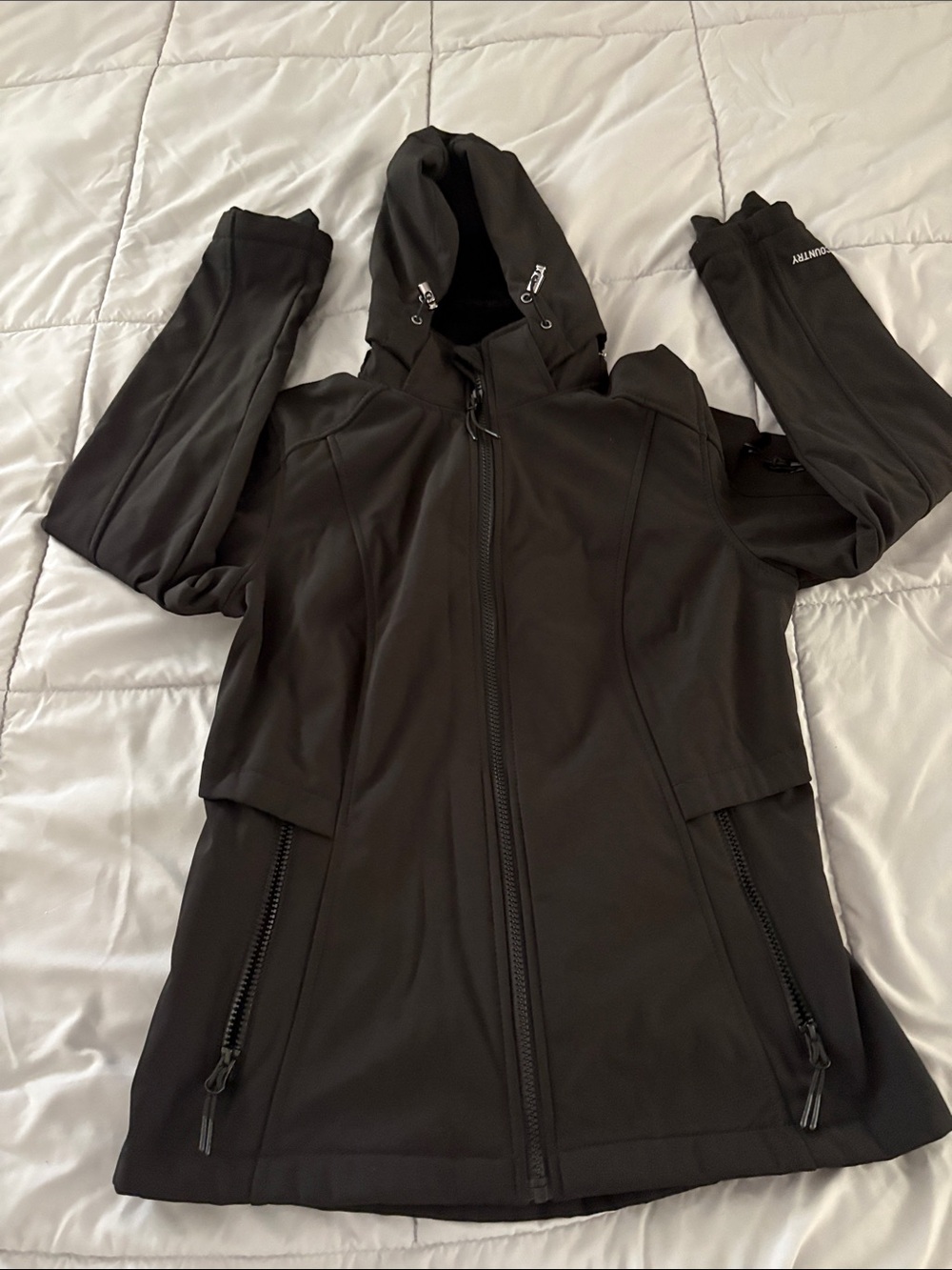 Women’s black jacket.